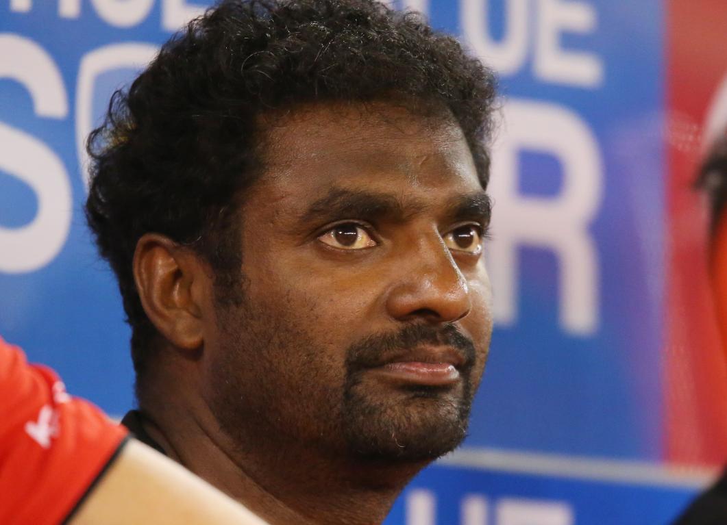 Muralitharan reacts to Sri Lanka coach Mickey Arthur’s animated outburst during the 2nd ODI against India