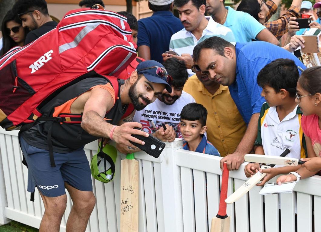 Watch – Virat Kohli receives a special gift from a young fan in West Indies Watch – Virat Kohli receives a special gift from a young fan in West Indies
