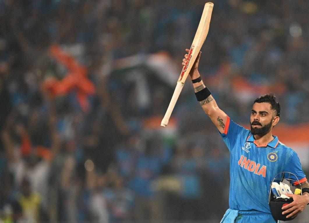 Virat Kohli’s unbeaten century propels India to their fourth straight win in the World Cup