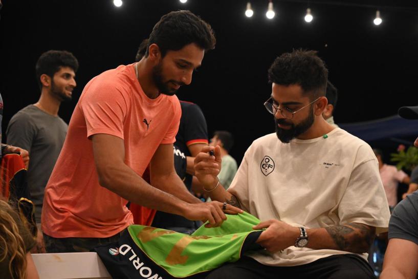 Mohammed Azharuddeen took to social media to post a picture of Virat Kohli autographing a jersey for him.